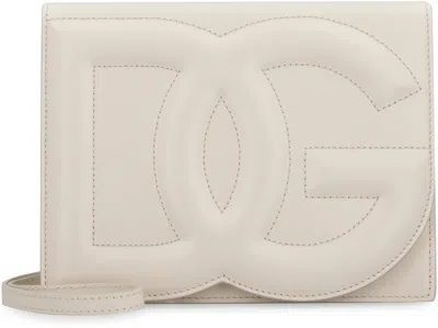 Shop Dolce & Gabbana Ivory Dg Logo Leather Crossbody Handbag In White