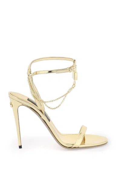 Shop Dolce & Gabbana Laminated Leather Sandals With Charm In Gold For Women