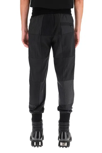 Shop Dolce & Gabbana Patchwork Wool Joggers In Black