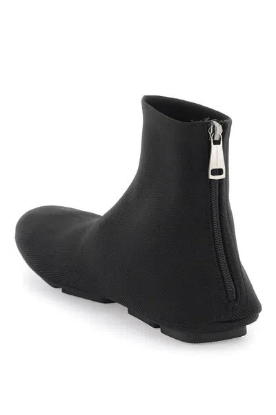 Shop Dolce & Gabbana Sleek Stretch Knit Ankle Boots For Men In Black
