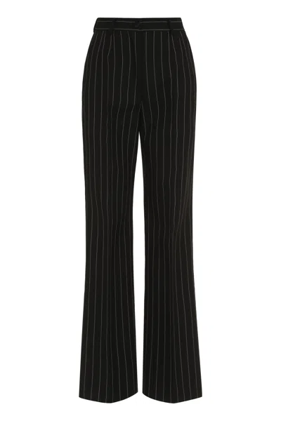 Shop Dolce & Gabbana Black Pinstriped Wool Trousers For Women