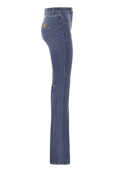 Shop Elisabetta Franchi Navy Flared Stretch Cotton Jeans With Gold Logo Plaques And Buttons