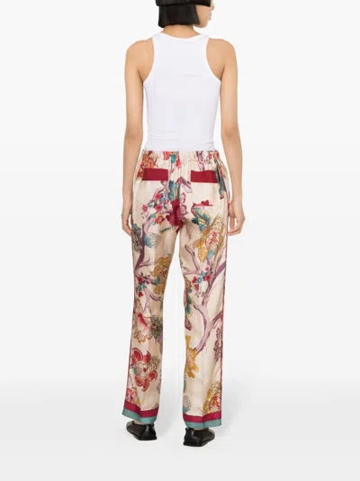 Shop F.r.s For Restless Sleepers Green Floral Print Silk Trousers For Women In Pink