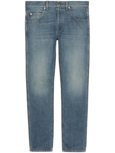Shop Gucci Organic Cotton Denim Tapered-leg Jeans In Navy For Men In Blue