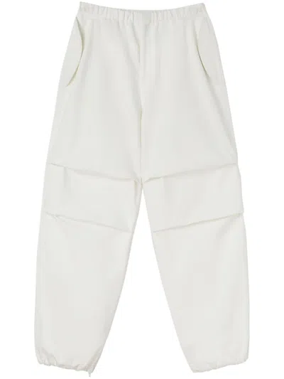 Shop Jil Sander Ivory White Tapered Cotton Trousers For Men | Fw23 Collection