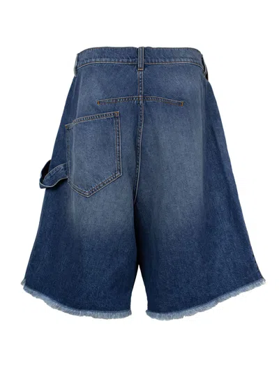 Shop Jw Anderson Men's Twisted Denim Shorts For Ss24 In Blue