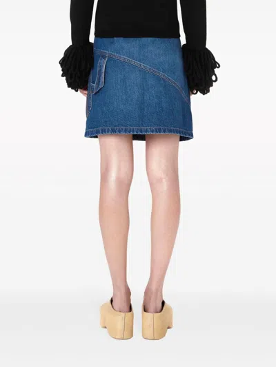 Shop Jw Anderson Twisted Denim Mini Skirt In Light Blue
