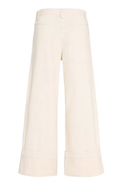 Shop Moncler Genius Cream-colored Denim Pants For Women With Flared Hem