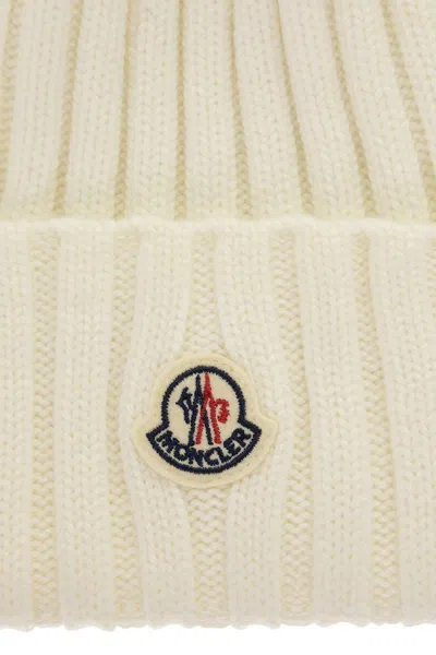 Shop Moncler Merino Wool Rib-knit Hat With Synthetic Pom-pom In White