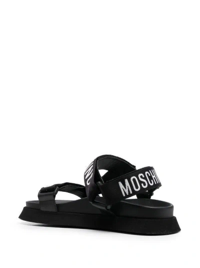 Shop Moschino Couture Women's Black Jacquard-logo Strap Sandals For Ss24