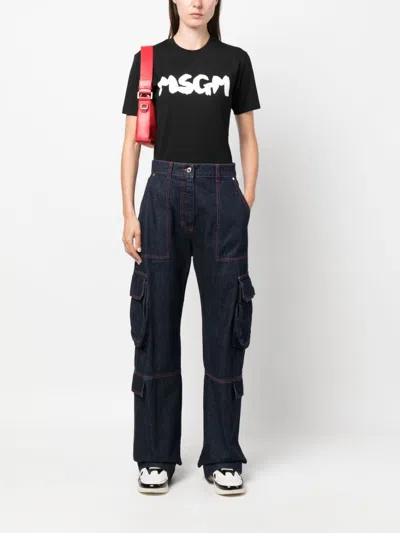 Shop Msgm Flared Cargo Jeans In Dark Wash For Women In Blue