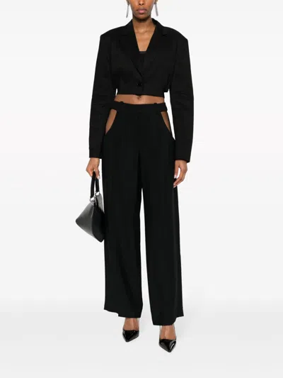 Shop Mugler Sleek Cut-out Trousers In Crisp Black For Women