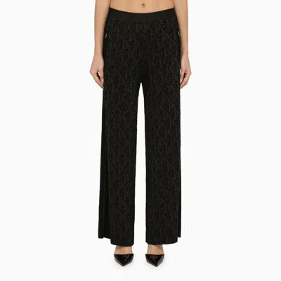 Shop Palm Angels All-over Jacquard Logo Trousers For Women In Black