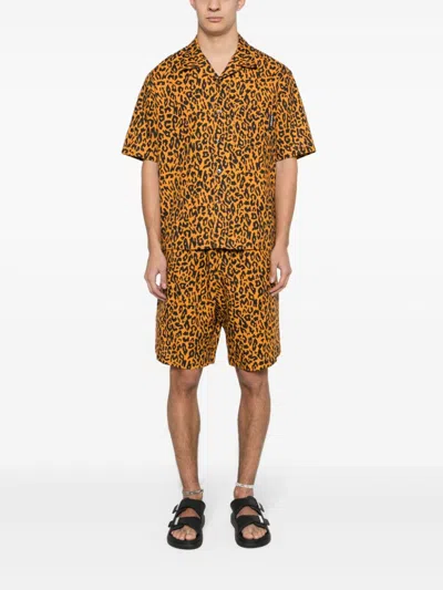 Shop Palm Angels Leopard Print Linen-cotton Blend Shorts For Men In Orange
