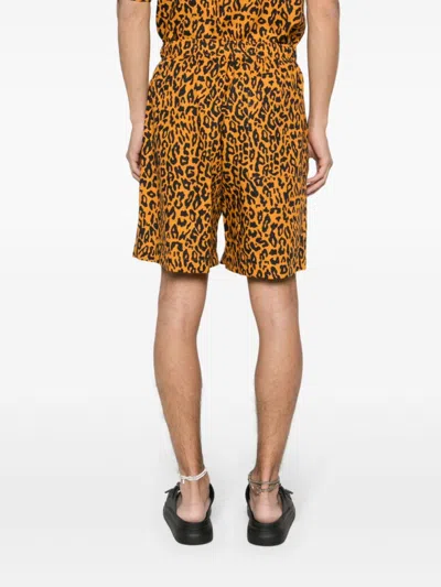 Shop Palm Angels Leopard Print Linen-cotton Blend Shorts For Men In Orange