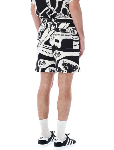 Shop Rhude Graphic Print Silk Strada Shorts For Men In Black