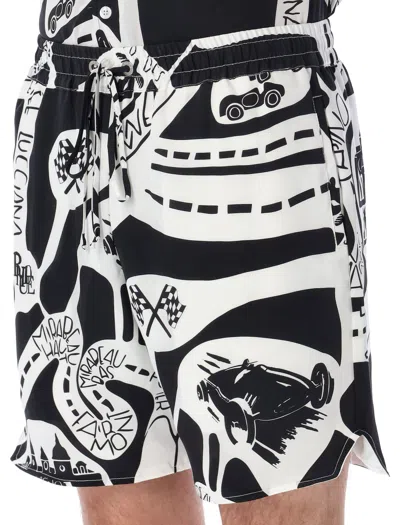 Shop Rhude Graphic Print Silk Strada Shorts For Men In Black