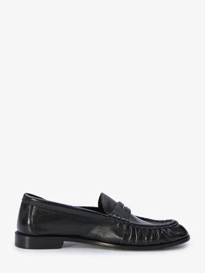 Shop Saint Laurent Black Shiny And Crinkled Lambskin Loafers With Ysl Monogram For Women