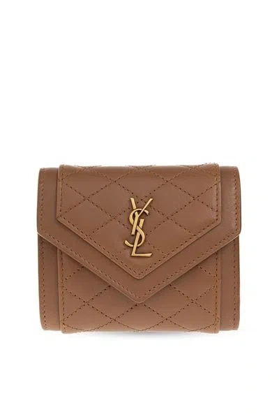 Shop Saint Laurent Luxurious Quilted Purse In Navy Blue For Women In Brown