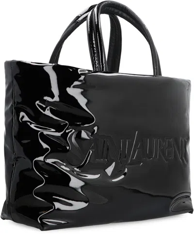 Shop Saint Laurent Padded Nylon Maxi Tote Handbag In Black