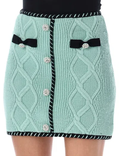 Shop Self-portrait Mint Cable Knit Mini Skirt With Bow Pockets And Diamanté Buttons For Women