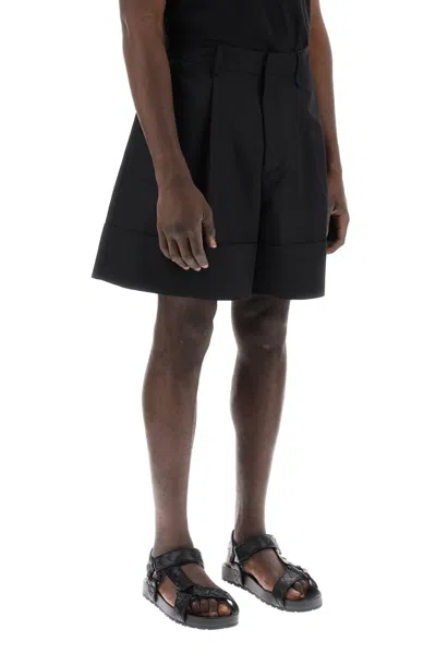 Shop Simone Rocha Men's Sculpted Bermuda Pants In Black For Ss24