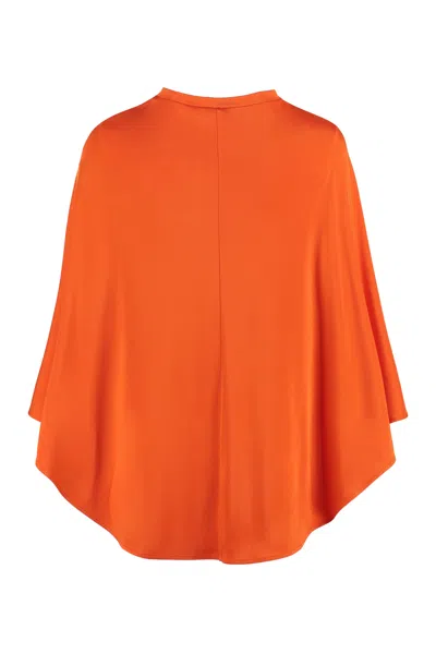 Shop Stella Mccartney Asymmetrical Wool Cape In Orange For Women