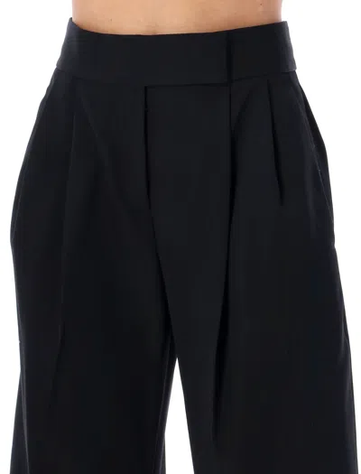 Shop Attico Black High Waisted Pants With Embroidered Logo And Wide Banana Legs For Women