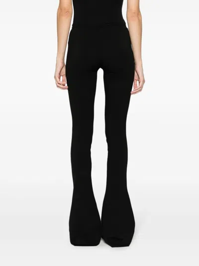 Shop Attico Black Zip-embellished Flared Trousers For Women