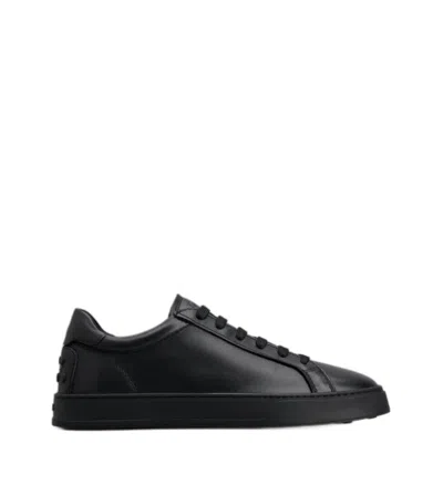 Shop Tod's Studded Leather Sneakers For Men In Black