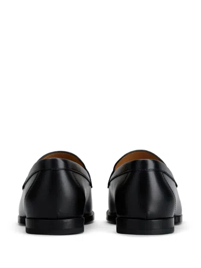 Shop Tod's Black Leather Chain-link Loafers For Women