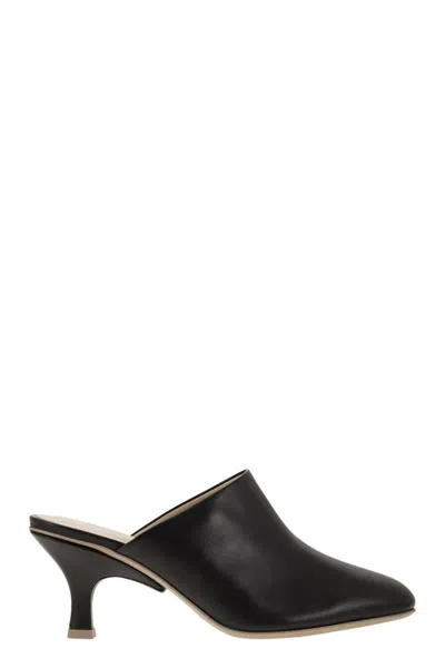 Shop Tod's Luxurious Italian-made Leather Sabot With Contrasting Sole For Women In Black