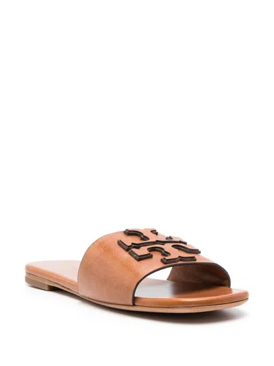 Shop Tory Burch Embossed-logo Slide Sandals For Women In White Leather In Leather Brown