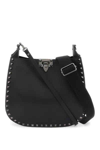 Shop Valentino Black Grained Leather Hobo Handbag With Tonal Studs For Women