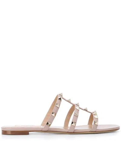 Shop Valentino Powder Pink Leather Sandals With Gold-tone Rockstud Embellishment In White