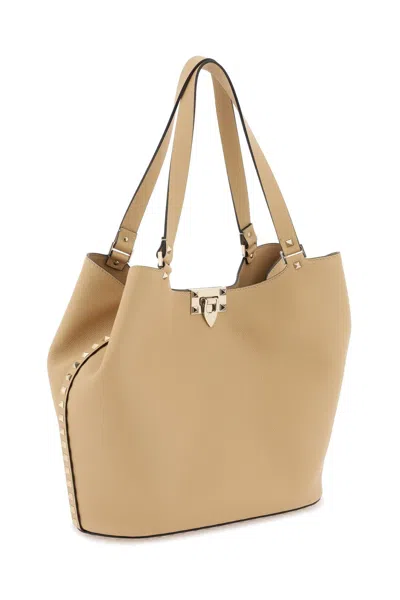 Shop Valentino Hammered Leather Tote Handbag With Platinum Studs In Beige