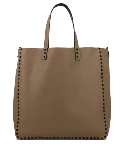 Shop Valentino Men's Brown Leather Studded Shoulder Handbag For Ss24