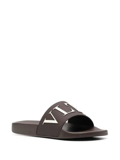 Shop Valentino Men's Fw23 Testa Di Moro Rubber Slide Sandals In Brown