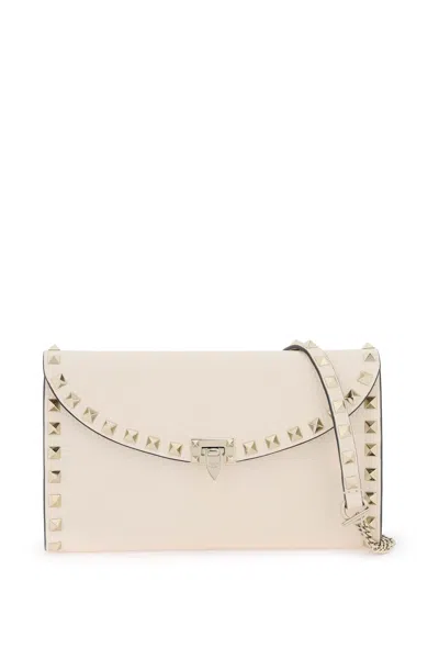 Shop Valentino Mini Hammered Leather Crossbody Bag With Iconic Studs And Detachable Pouch In White