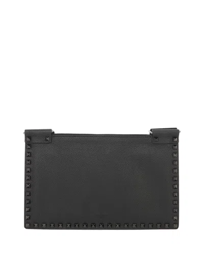Shop Valentino Rockstud Flat Crossbody Handbag For Men In Black