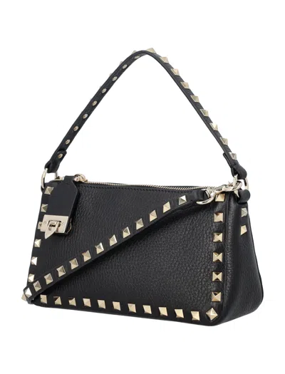 Shop Valentino Small Rockstud Grainy Calfskin Leather Handbag For Women In Black