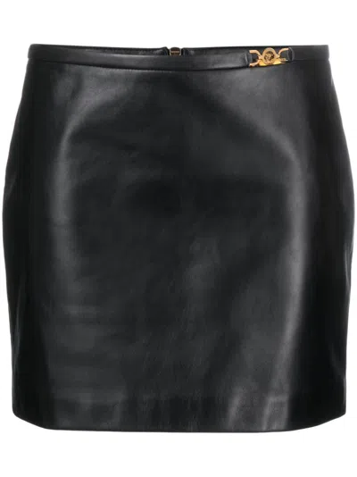 Shop Versace Black Leather Medusa-embellished Miniskirt For Women