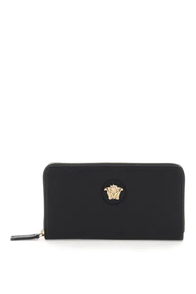 Shop Versace Black Leather Zip-around Wallet With Gold Medusa Appliqué