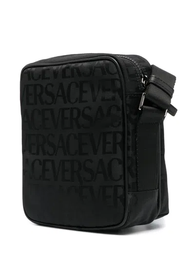 Shop Versace Black Logo Print Messenger Handbag For Men