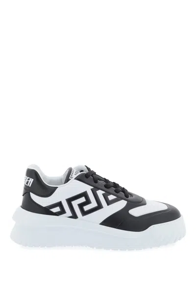 Shop Versace Embossed Leather Sneaker With Greek Motif Print And Lettering Details In Multicolor
