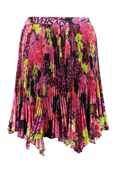 Shop Versace Floral Orchid Print Asymmetric Pleated Skirt For Women In Multicolor