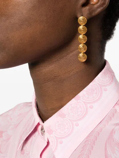 Shop Versace Glamorous Golden Medusa Drop Earrings For Women