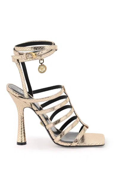 Shop Versace Luxurious Snake-effect Sandals For The Fashion-forward Woman In Gold