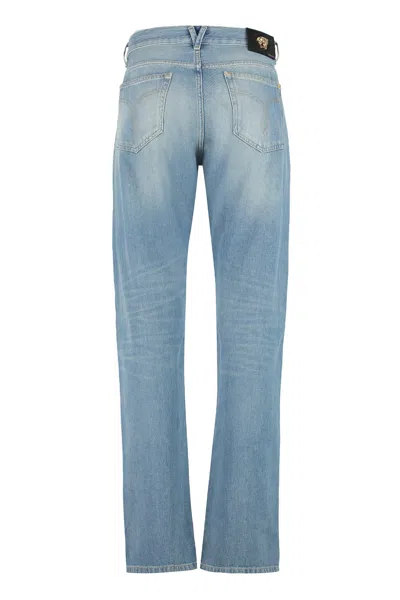 Shop Versace Men's Blue Straight-leg Jeans With Contrast Stitching And Customized Logo Rivets