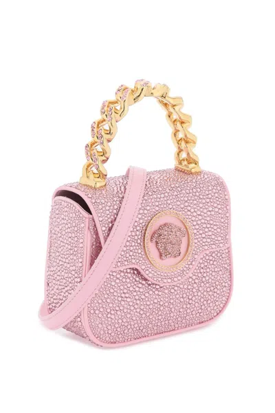 Shop Versace Satiny Pink Handbag With Crystals And Iconic Medusa Appliqué